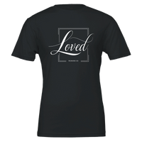 Black t-shirt with 'Loved' text on a white background